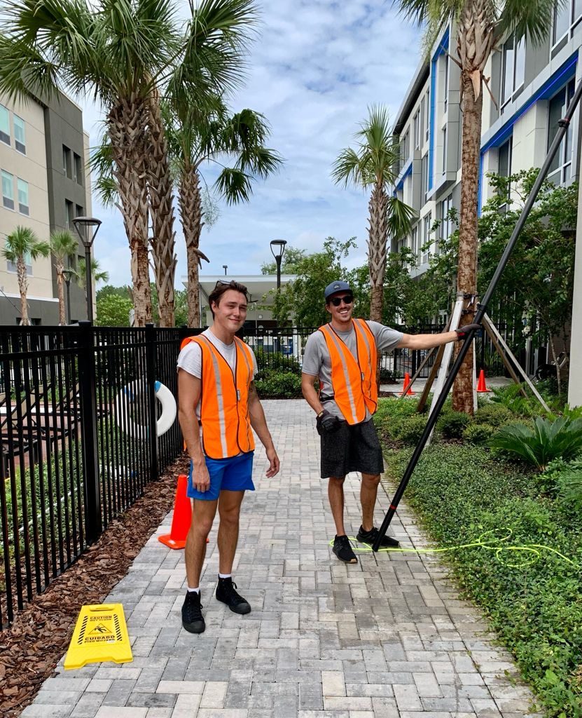 Windermere Window Cleaners technicians on site at an apartment community