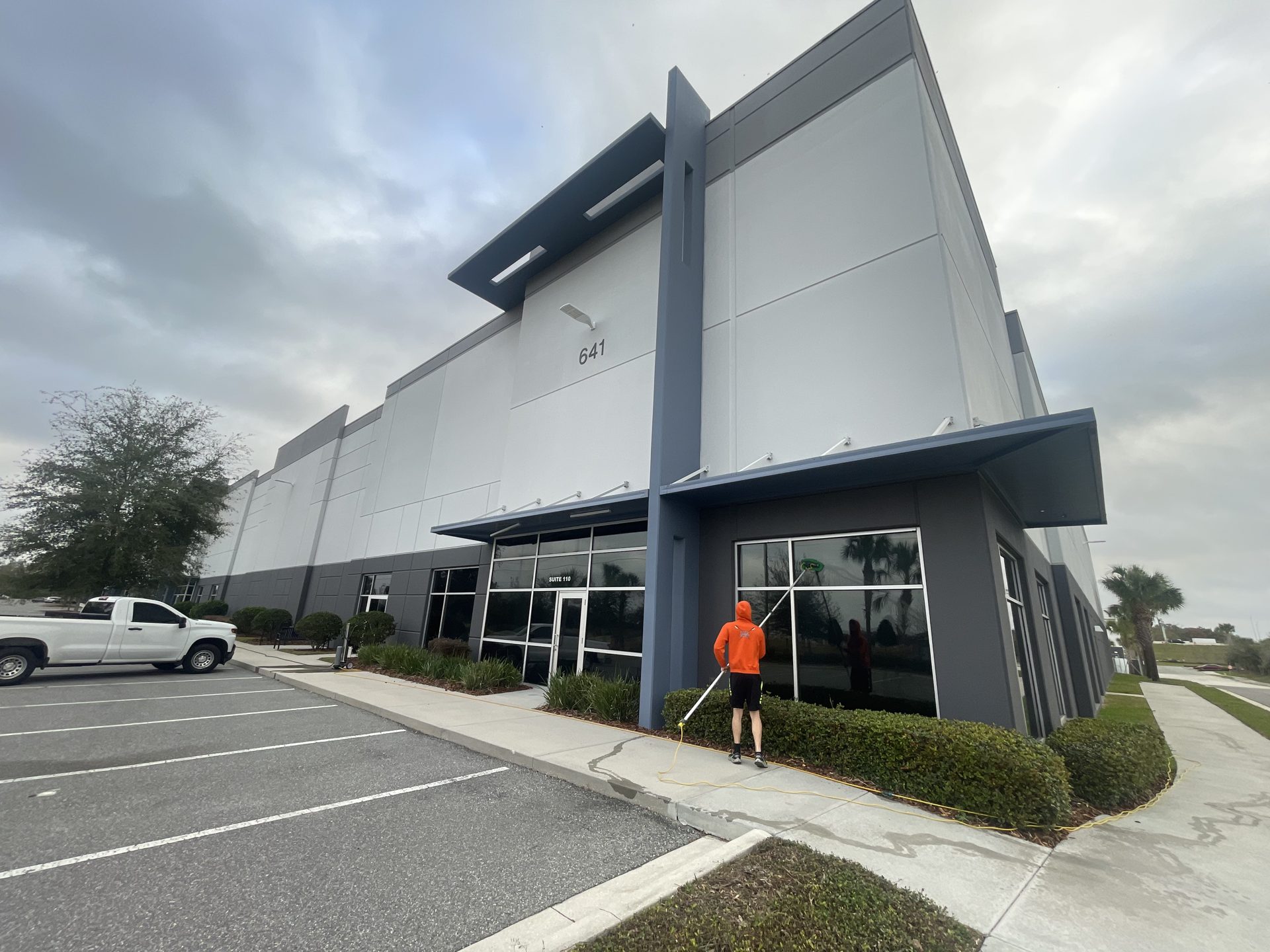 Commercial window cleaning at a warehouse and office building in Central Florida